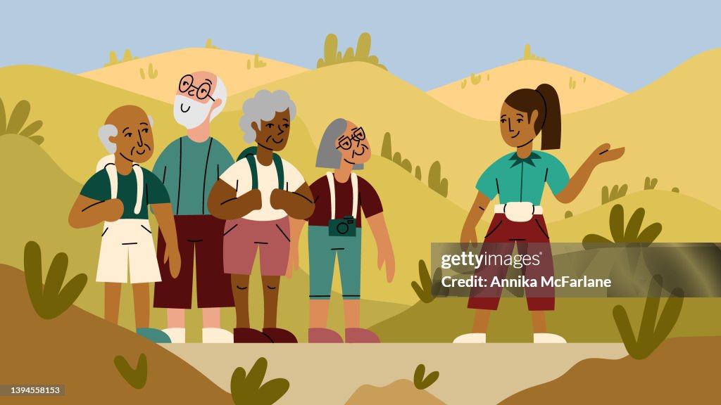 A Multiracial Group of Seniors Enjoy a Walking Tour Together with Tour Guide