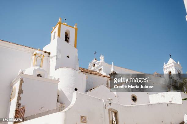 santiago church in tavira, portugal. - algarve bildbanksfoton och bilder