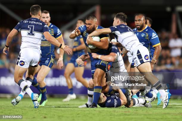 Isaiah Papali'i of the Eels is tackled during the round eight NRL match between the Parramatta Eels and the North Queensland Cowboys at TIO Stadium,...