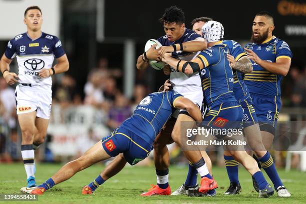 JMurray Taulagi of the Cowboys is tackled during the round eight NRL match between the Parramatta Eels and the North Queensland Cowboys at TIO...