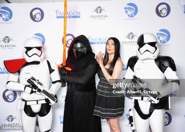 Celeste Thorson poses with Kylo Ren and Storm Trooper attend 2022 Yuri's Night Los Angeles: The World Space Party held at California Science Center...