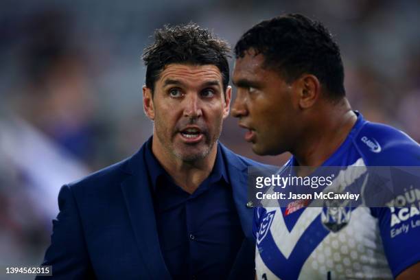 Bulldogs coach Trent Barrett talks to Tevita Pangai Junior of the Bulldogs during the round eight NRL match between the Canterbury Bulldogs and the...