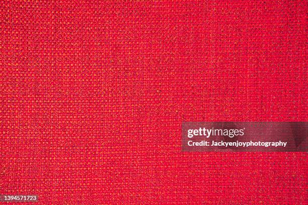 abstract background from red fabric texture. - red shirt stockfoto's en -beelden