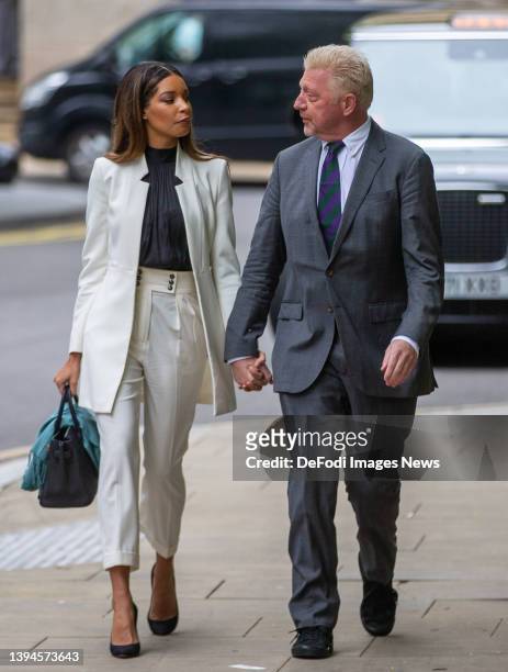 Boris Becker arrives at court for his sentencing hearing alongside his girlfriend Lilian de Carvalho Monteiro at Southwark Crown Court on April 29,...