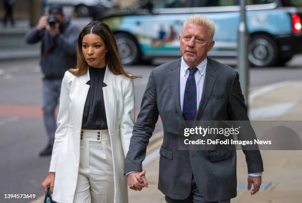 Boris Becker arrives at court for his sentencing hearing alongside his girlfriend Lilian de Carvalho Monteiro at Southwark Crown Court on April 29,...