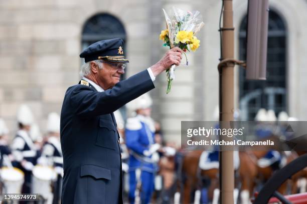 King Carl XVI Gustaf of Sweden receives flowers during his 76th birthday celebration at the Royal Palace on April 30, 2022 in Stockholm, Sweden.
