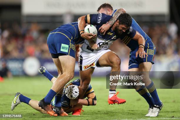 Jordan McLean of the Cowboys is tackled during the round eight NRL match between the Parramatta Eels and the North Queensland Cowboys at TIO Stadium,...