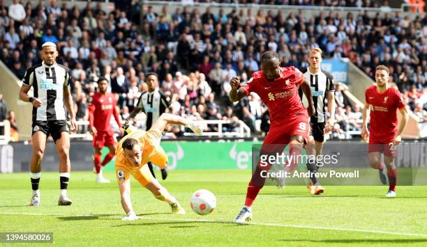 Naby Keita of Liverpool scoring the opening goal during the Premier League match between Newcastle United and Liverpool at St. James Park on April...