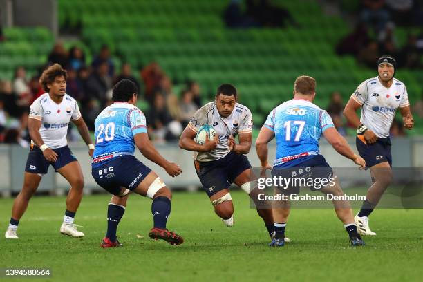 Veikoso Poloniati of Moana Pasifika runs with the ball during the round 11 Super Rugby Pacific match between the Melbourne Rebels and the Moana...