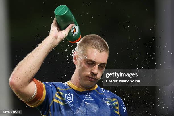 Shaun Lane of the Eels sprays water on himself during the round eight NRL match between the Parramatta Eels and the North Queensland Cowboys at TIO...