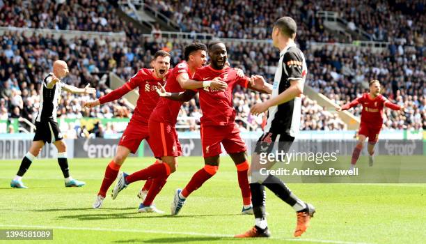 Naby Keita of Liverpool celebrates after scoring the opening goal during the Premier League match between Newcastle United and Liverpool at St. James...