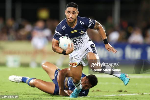 Valentine Holmes of the Cowboys makes a break during the round eight NRL match between the Parramatta Eels and the North Queensland Cowboys at TIO...