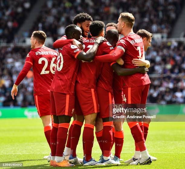 Naby Keita of Liverpool celebrates after scoring the first goal during the Premier League match between Newcastle United and Liverpool at St. James...