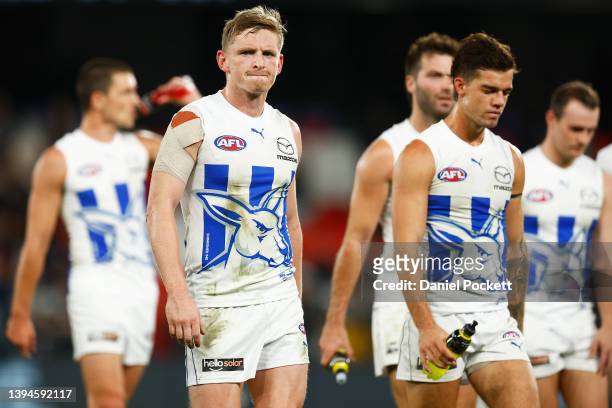 Jack Ziebell of the Kangaroos and Jy Simpkin of the Kangaroos look dejected aft the round seven AFL match between the Carlton Blues and the North...
