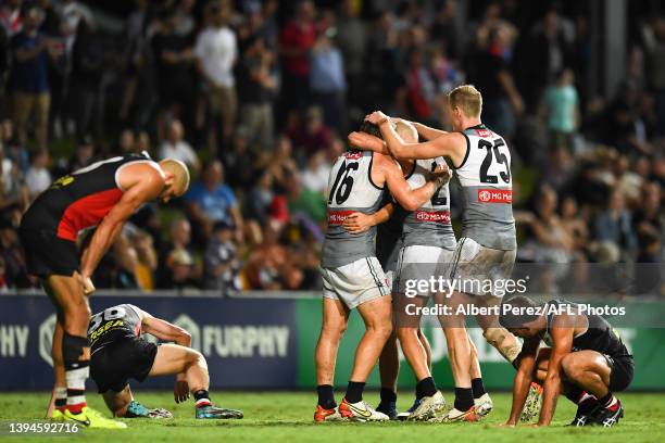 Port Adelaide Power celebrate victory during the round seven AFL match between the St Kilda Saints and the Port Adelaide Power at Cazaly's Stadium on...