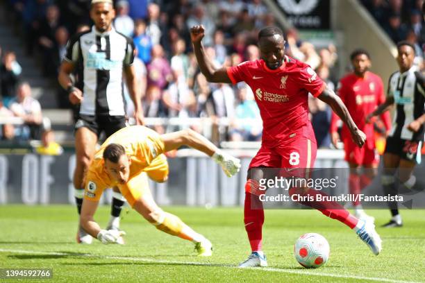 Naby Keita of Liverpool scores the opening goal past Martin Dubravka of Newcastle United during the Premier League match between Newcastle United and...
