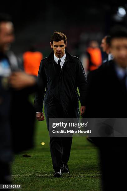 Dejected Andre Villas-Boas the Chelsea manager walks off the pitch following his team's 3-1 defeat during the UEFA Champions League round of 16 first...