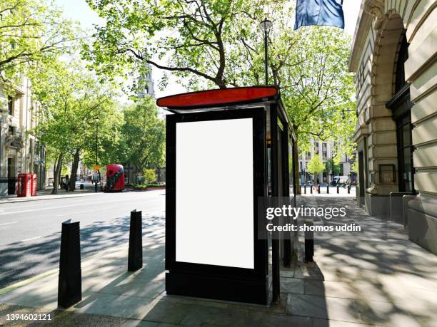 street of london with blank digital billboard at a bus stop - bus poster fotografías e imágenes de stock