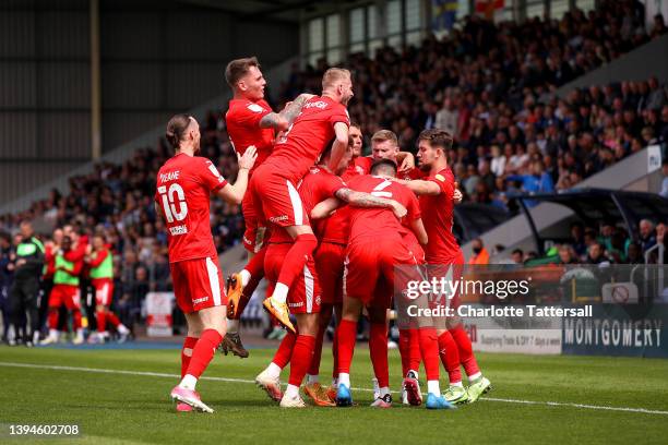 Jason Kerr, Jack Whatmough, Will Keane, Callum Lang, Kelland Watts, Jordan Cousins, Max Power and James McClean of Wigan Athletic celebrate their...