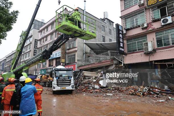 Rescuers work at the collapse site of a self-constructed residential building on April 30, 2022 in Changsha, Hunan Province of China. The incident...
