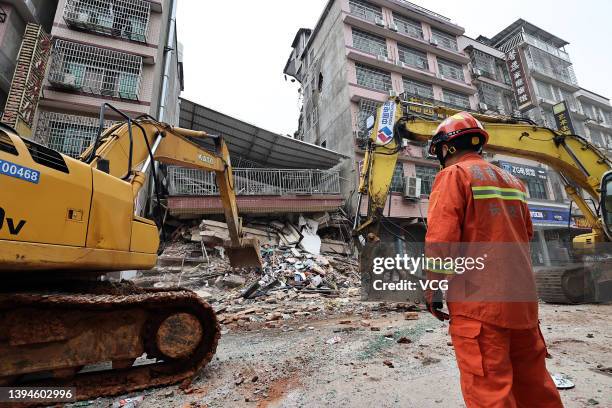 Rescuers work at the collapse site of a self-constructed residential building on April 29, 2022 in Changsha, Hunan Province of China. The incident...