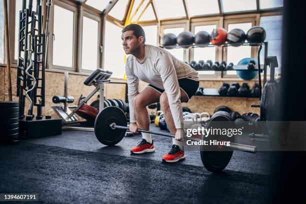 man training in gym - deadlift stock pictures, royalty-free photos & images