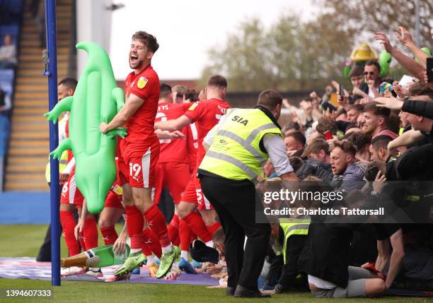 Callum Lang celebrates after their sides second goal by Will Keane of Wigan Athletic during the Sky Bet League One match between Shrewsbury Town and...