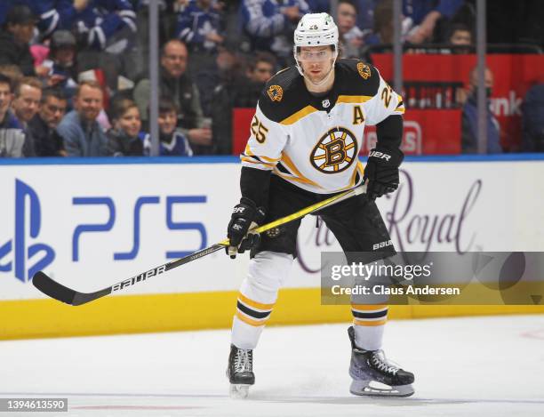 Brandon Carlo of the Boston Bruins skates against the Toronto Maple Leafs during an NHL game at Scotiabank Arena on April 29, 2022 in Toronto,...