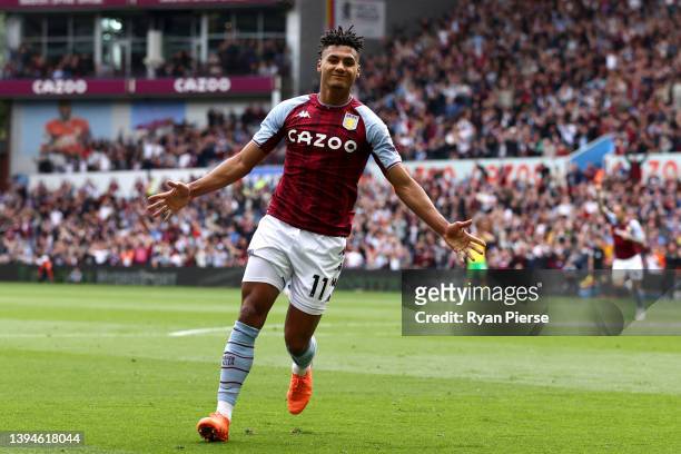Ollie Watkins of Aston Villa celebrates after scoring their team's first goal during the Premier League match between Aston Villa and Norwich City at...