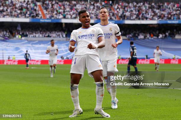 Rodrygo of Real Madrid celebrates with teammate Lucas Vazquez after scoring their team's second goal during the LaLiga Santander match between Real...