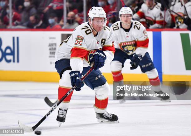 Patric Hornqvist of the Florida Panthers skates the puck against the Montreal Canadiens during the third period at Centre Bell on April 29, 2022 in...