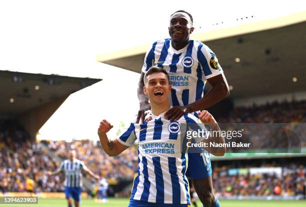 Leandro Trossard celebrates with Danny Welbeck of Brighton & Hove Albion after scoring their team's second goal during the Premier League match...