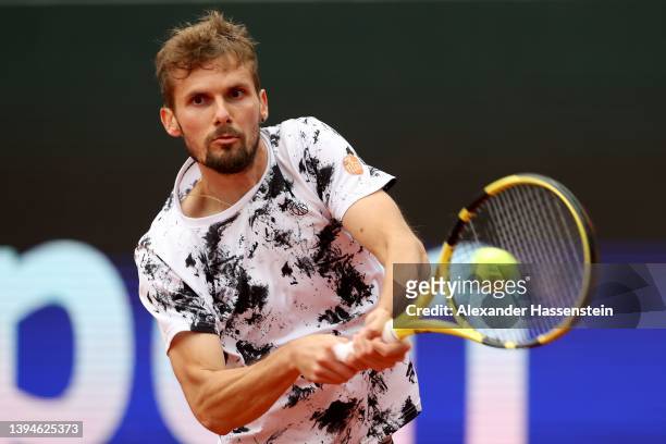 Oscar Otte of Germany plays a back hand during his semi-final match against Holger Rune of Denmark on day eight of the BMW Open by American Express...