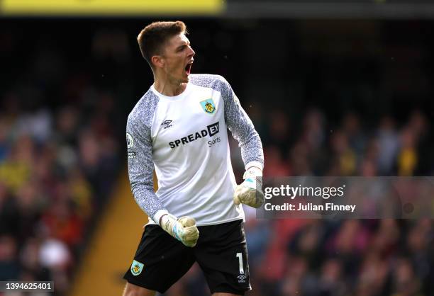 Nick Pope of Burnley celebrates after their sides first goal during the Premier League match between Watford and Burnley at Vicarage Road on April...