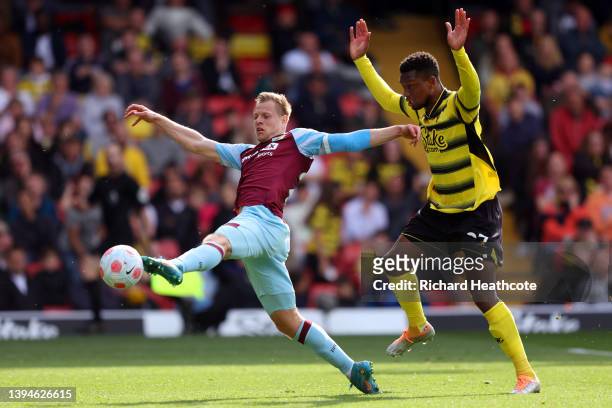 Matej Vydra of Burnley is challenged by Christian Kabasele of Watford FC during the Premier League match between Watford and Burnley at Vicarage Road...