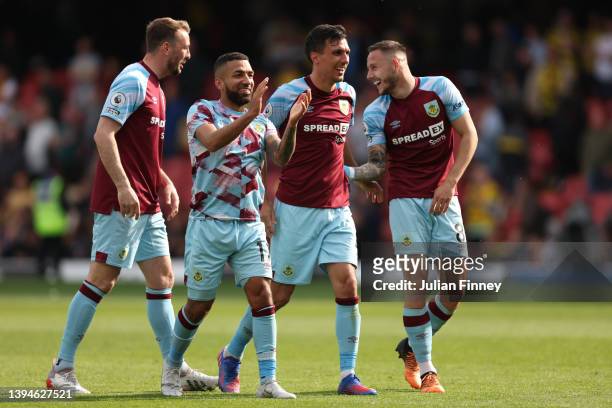 Aaron Lennon, Jack Cork and Josh Brownhill of Burnley celebrate after their sides victory during the Premier League match between Watford and Burnley...