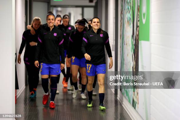 Melanie Serrano, Andrea Pereira of FC Barcelona and teammates walk out to warm up prior to the UEFA Women's Champions League Semi Final Second Leg...