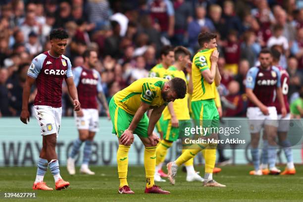 Grant Hanley of Norwich City looks dejected as their team were relegated at full-time after the Premier League match between Aston Villa and Norwich...