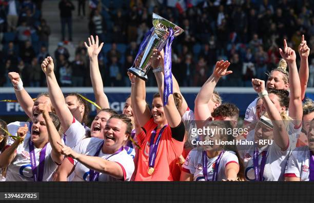 Sarah Hunter of England lifts the trophy after winning the grand slam following the TikTok Women's Six Nations match between France and England at...