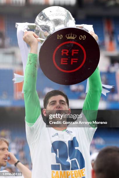 Thibaut Courtois of Real Madrid celebrates following their side's victory in the LaLiga Santander match between Real Madrid CF and RCD Espanyol for...