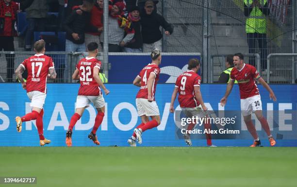 Lucas Hoeler of Sport-Club Freiburg is congratulated after scoring a goal during the Bundesliga match between TSG Hoffenheim and Sport-Club Freiburg...