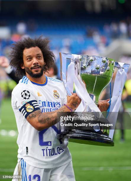 Marcelo Vieira of Real Madrid CF holds the LaLiga trophy as they celebrate winning La Liga Santander title after the LaLiga Santander match between...