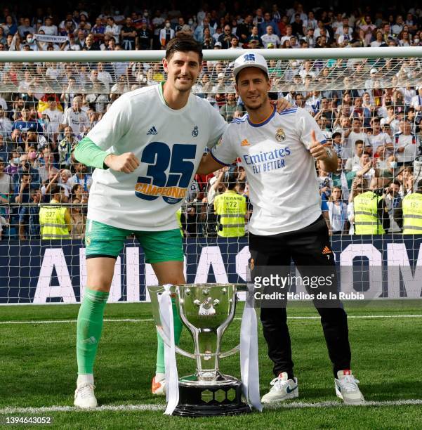 Thibaut Courtois and Eden Hazard of Real Madrid pose with the LaLiga trophy as they celebrate winning La Liga Santander title after the LaLiga...