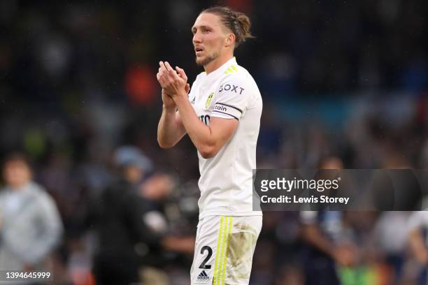 Luke Ayling of Leeds United applauds fans after the Premier League match between Leeds United and Manchester City at Elland Road on April 30, 2022 in...