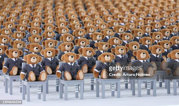 Teddy Bears in Thom Browne suits are seen at the Thom Browne Fall 2022 runway show on April 29, 2022 in New York City.