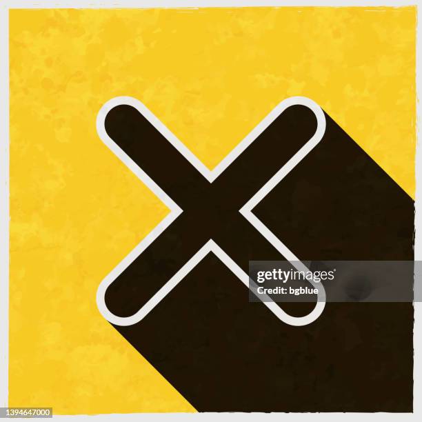 cross mark. icon with long shadow on textured yellow background - missing poster stock illustrations