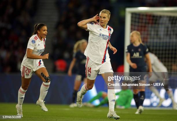 Ada Hegerberg of Lyon celebrates with team mate Delphine Cascarino after scoring her team's first goal during the UEFA Women's Champions League Semi...