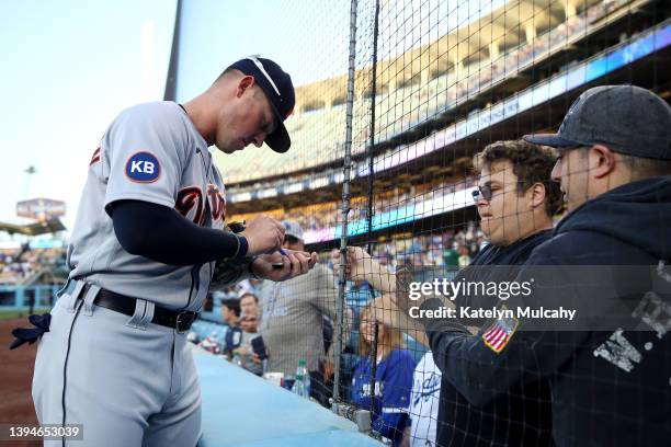 Spencer Torkelson of the Detroit Tigers signs autographs prior to the game against the Los Angeles Dodgers at Dodger Stadium on April 29, 2022 in Los...