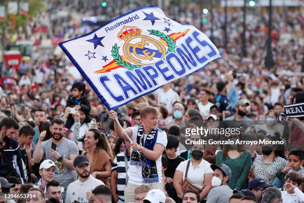 Fans of Real Madrid celebrate at Plaza de Cibeles following the victory in their LaLiga match against RCD Espanyol which lead to their 35th LaLiga...