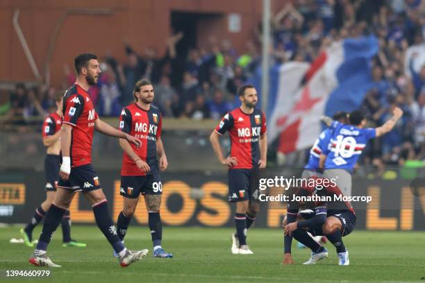 Sampdoria players celebrate as Domenico Criscito of Genoa CFC reacts at the final whistle after missing a 91st minute penalty that may have secured a...